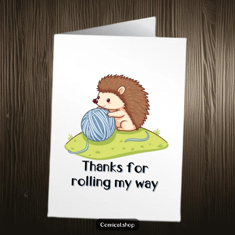 Funny Free Printable Thank You Card: A small hedgehog rolls a large ball of yarn down a hill, offering thanks with charming, playful energy.